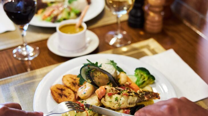 A couple eating a delicious meal at Gostoso.