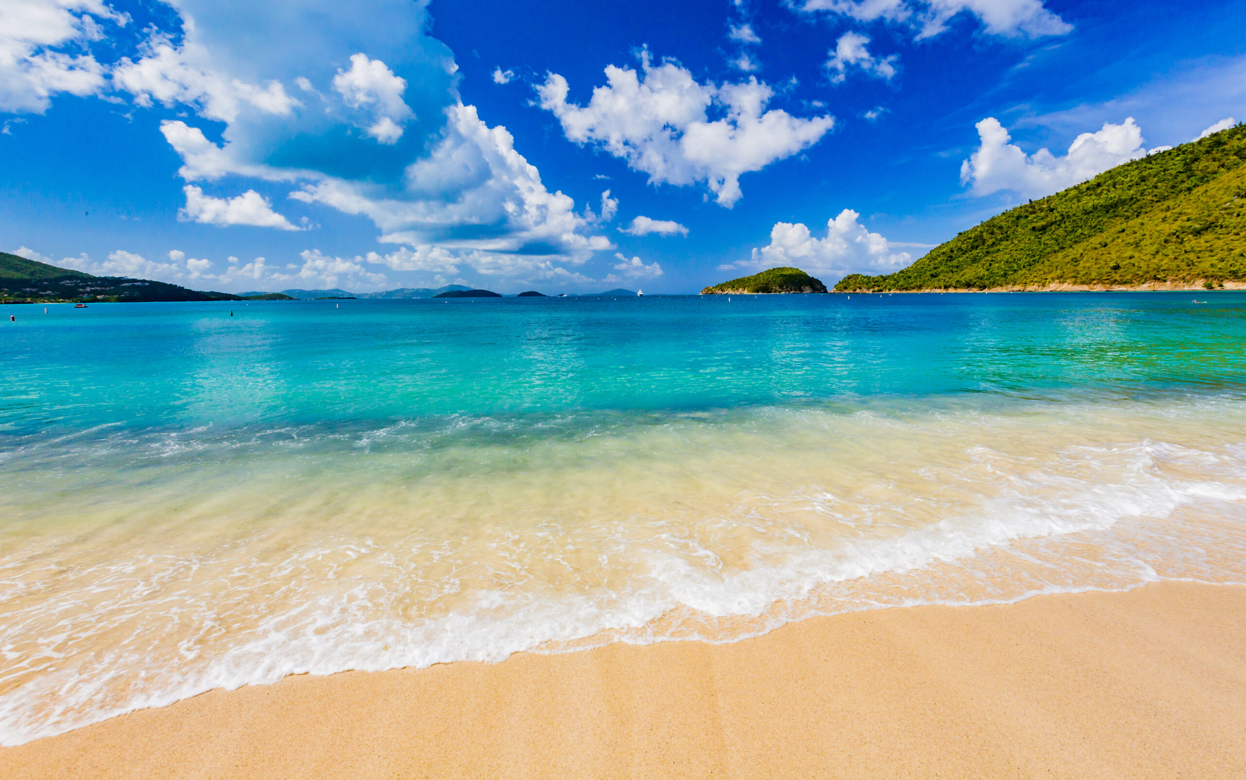 Gentle surf laps onto the sand in beautiful Francis Bay in St John, USVI.