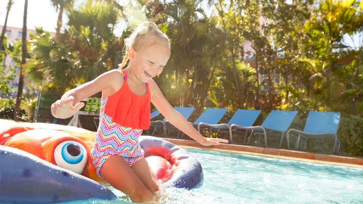 girl-playing-pool-atlantis-resort-bahamas