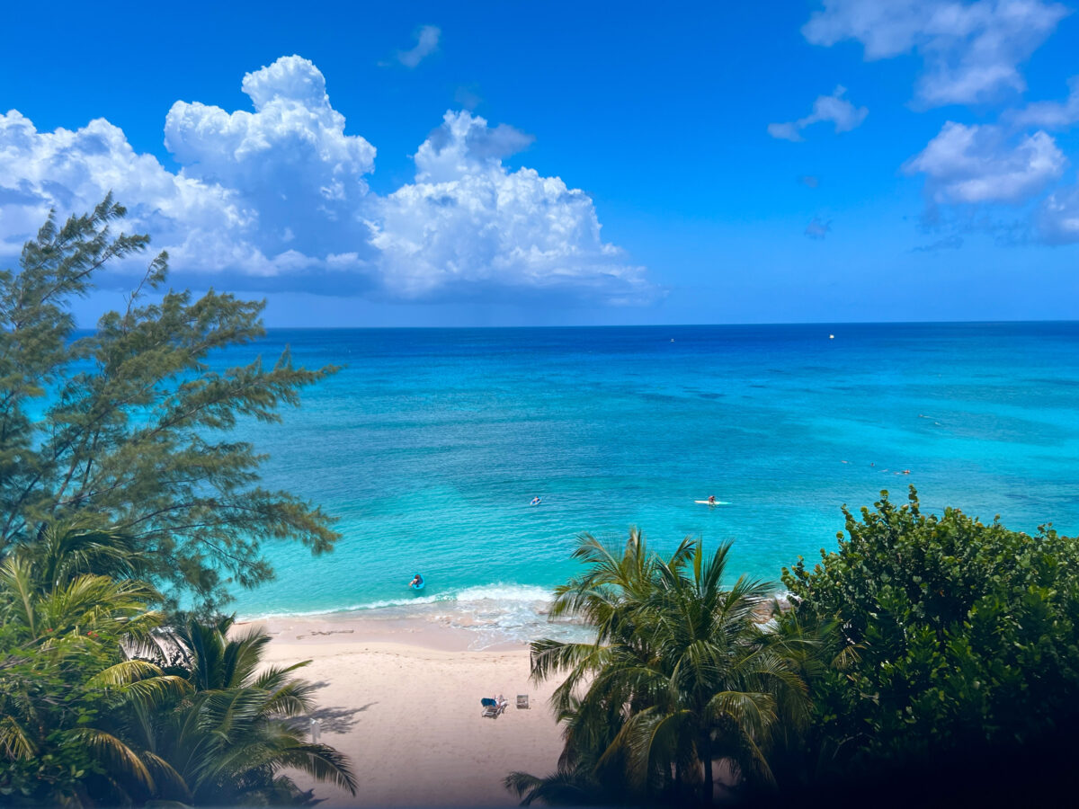 An aerial view of Cemetery Beach on Seven Mile Beach in Grand Cayman Island on a beautiful sunny day.
