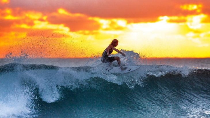surfer-blue-wave-sunset