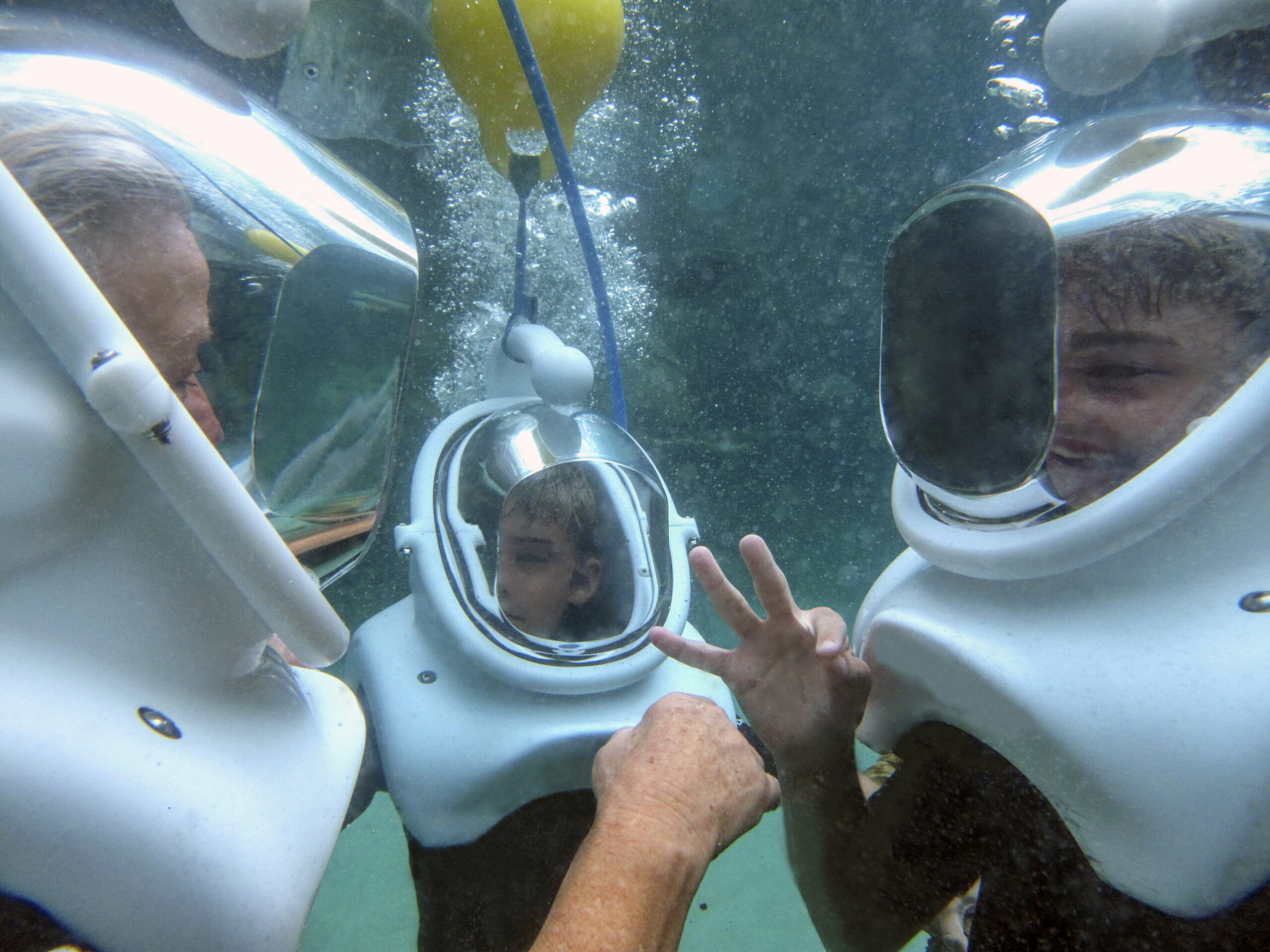 Grandmother & Grandsons - Helmet Dive.