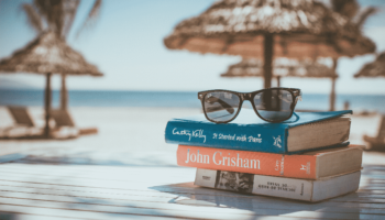 stack-books-beach-sunglasses