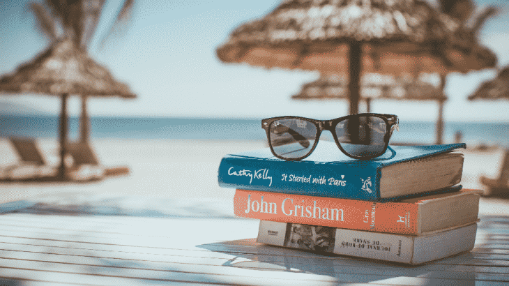 stack-books-beach-sunglasses