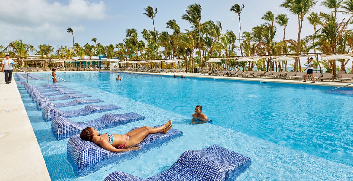 in-pool-loungers-riu-palace-punta-cana