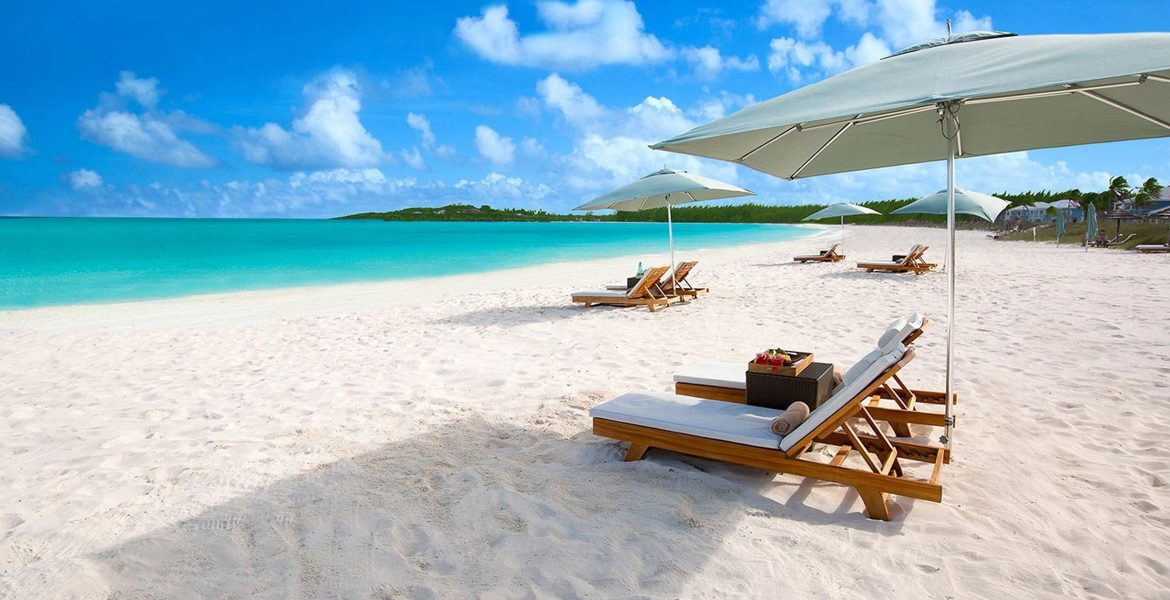 white-sand-sandals-emerald-bay-exumas-bahamas