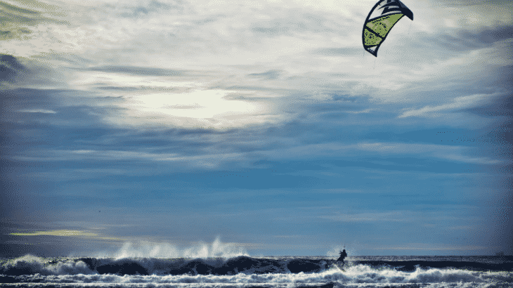 kiteboarder-waves-sunset