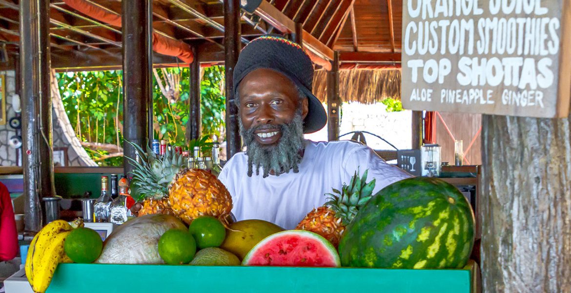 rockhouse-hotel-negril-jamaica-fruit-stand-man