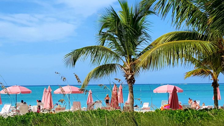 providenciales-turks-caicos-beach-pink-umbrellas