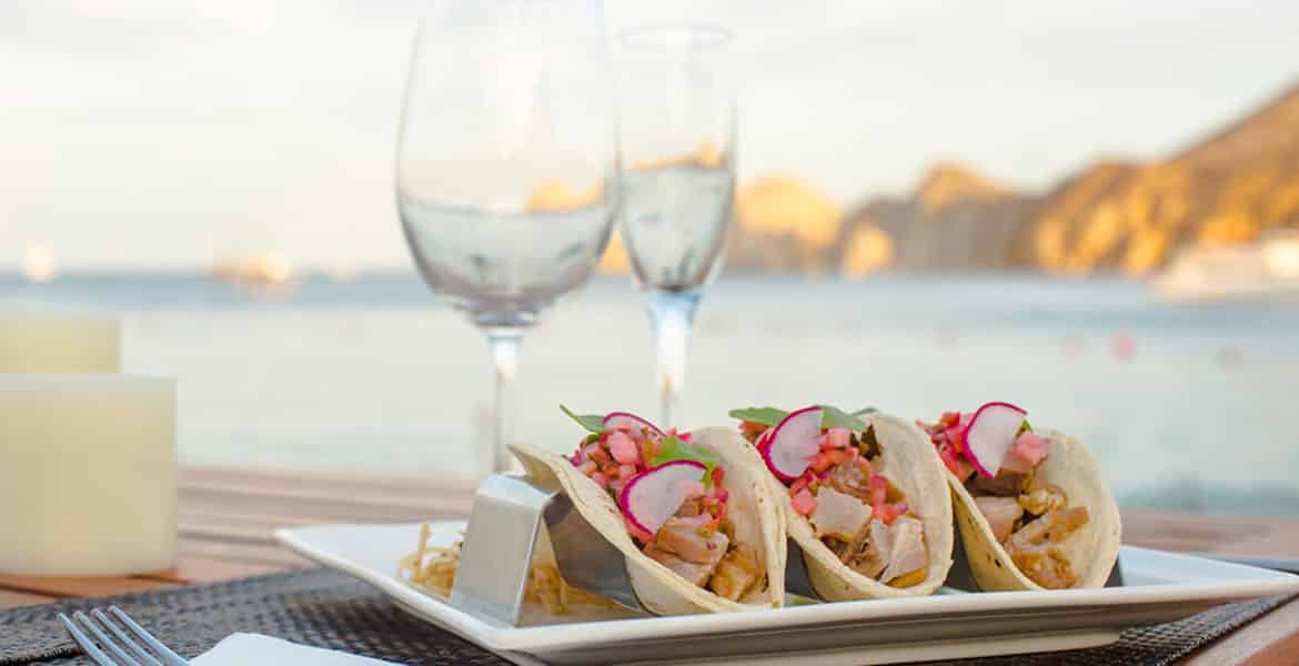 tacos-and-wine-glasses-overlooking-ocean