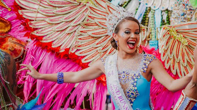 carnival-woman-blue-dress-pink-wings