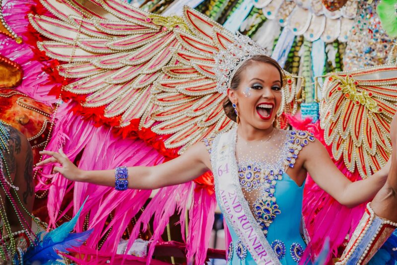 carnival-woman-blue-dress-pink-wings