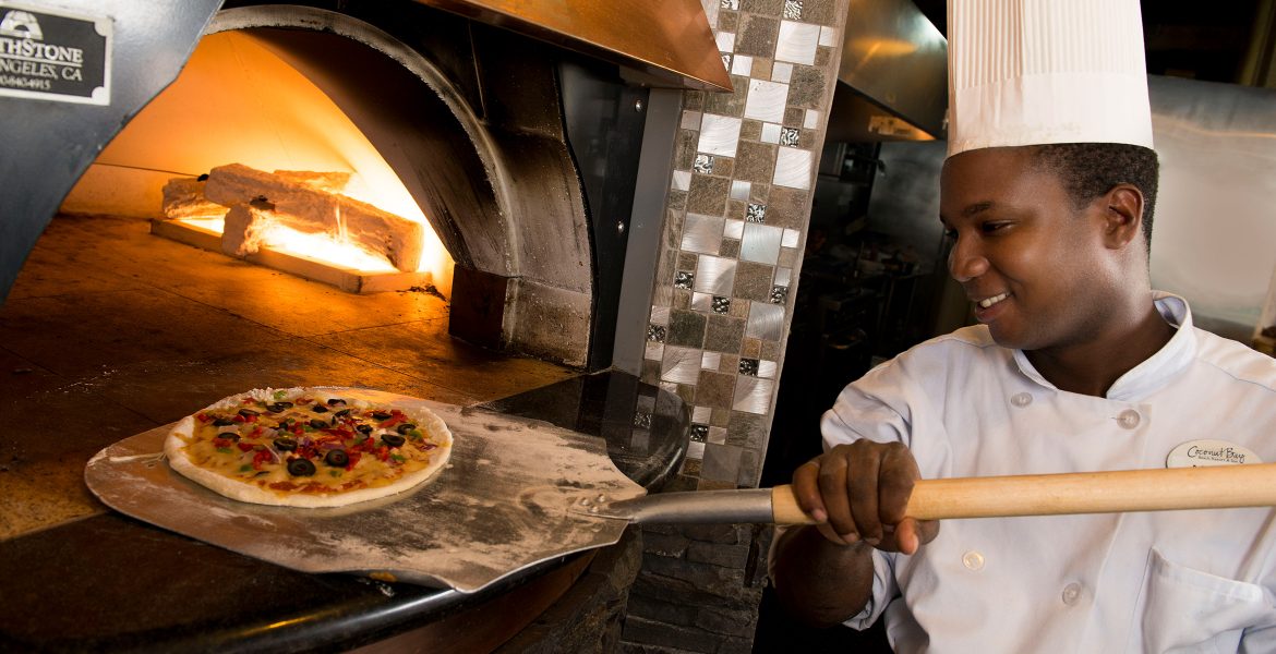 fire-oven-person-making-pizza