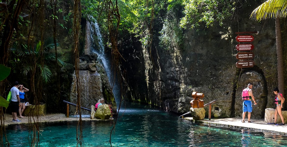 waterfall-and-people-wearing-lifevests