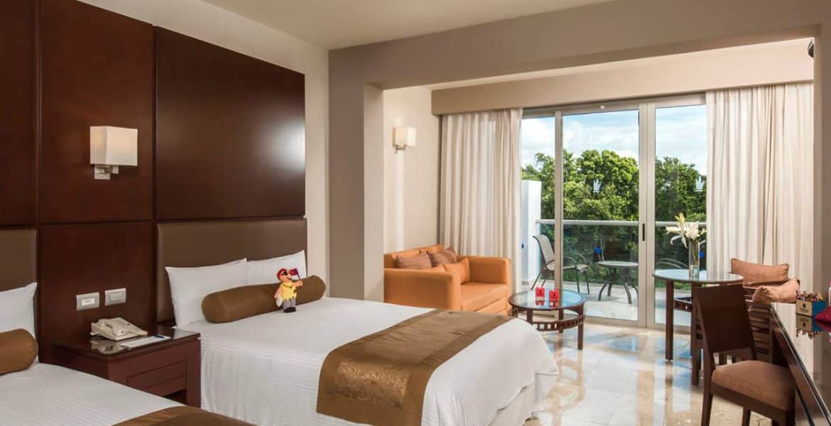 resort-suite-plush-white-bed-balcony