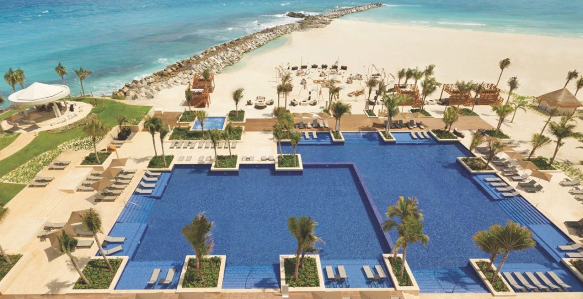 aerial-view-cancun-resort-pool-turquoise-ocean-surrounding