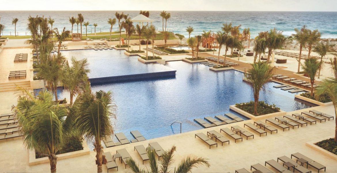 aerial-view-cancun-resort-pool-turquoise-ocean-surrounding