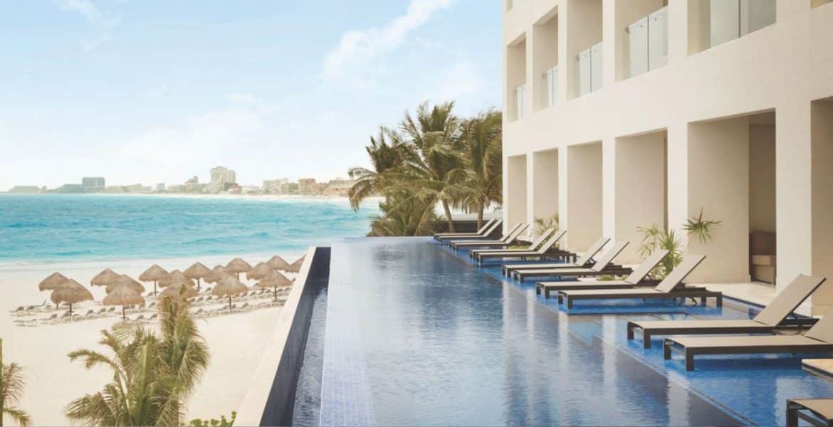 swim-up-suites-pool-beach-resort-ocean-background