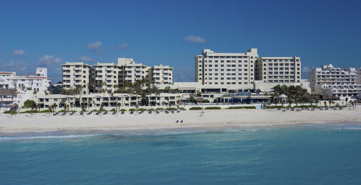 white-beach-resort-view-from-blue-ocean