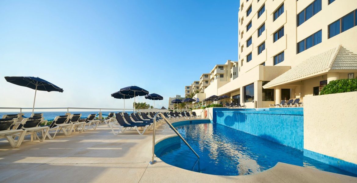 resort-blue-pool-umbrellas