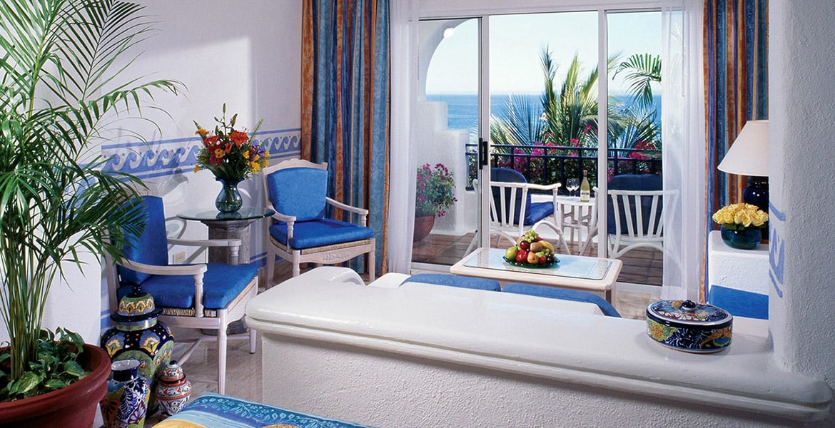 resort-suite-sitting-area-blue-decor-balcony-view