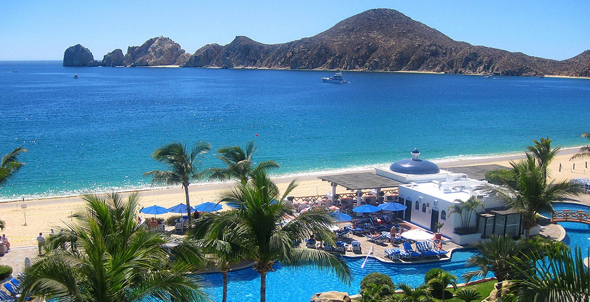 balcony-view-beach-resort-pool-turquoise-ocean-background