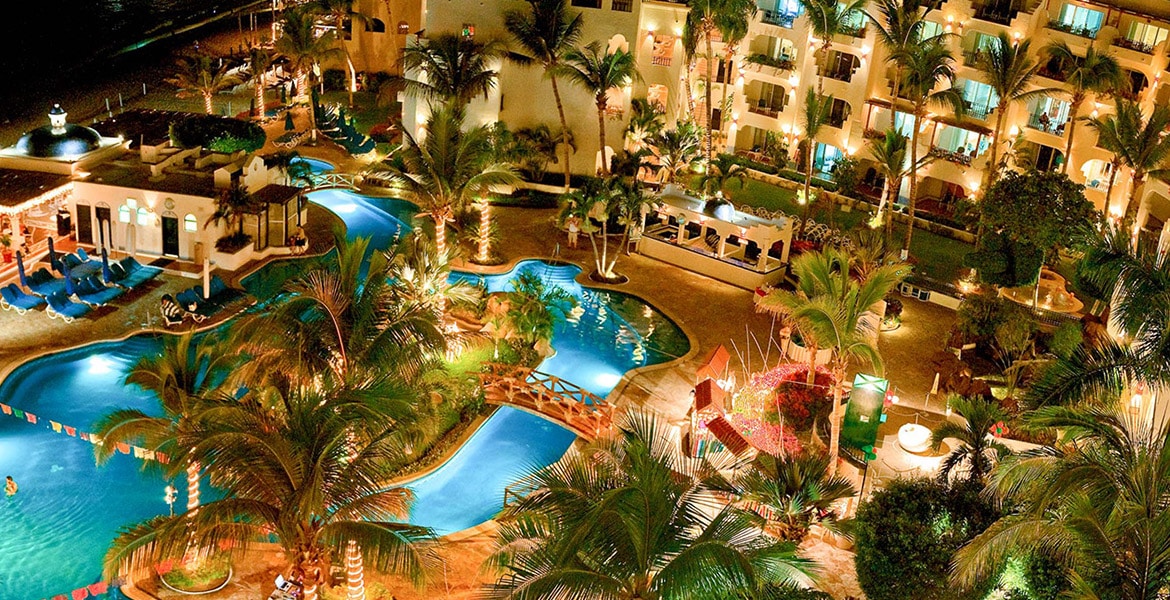 balcony-view-beach-resort-pool-at-sunset