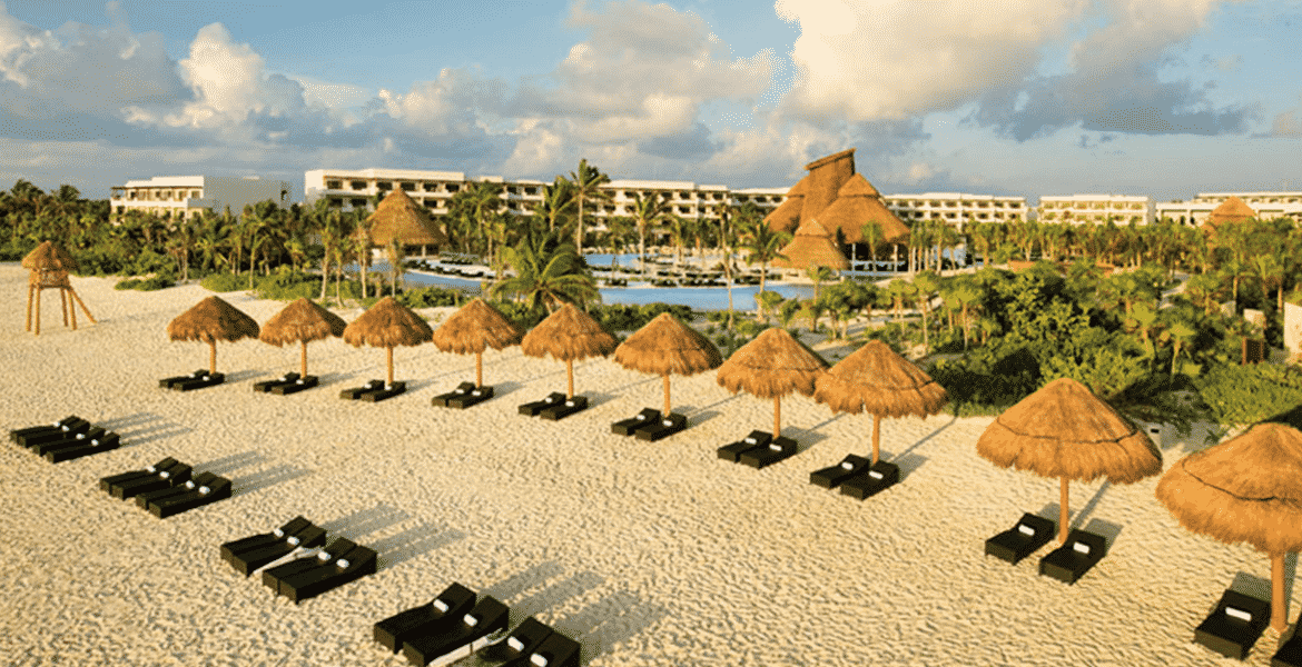 aerial-view-hotel-beach-tiki-umbrellas