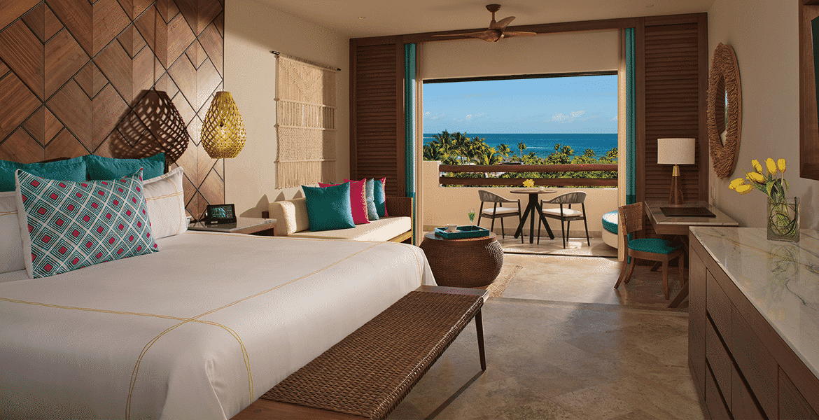 resort-suite-white-bed-ocean-view