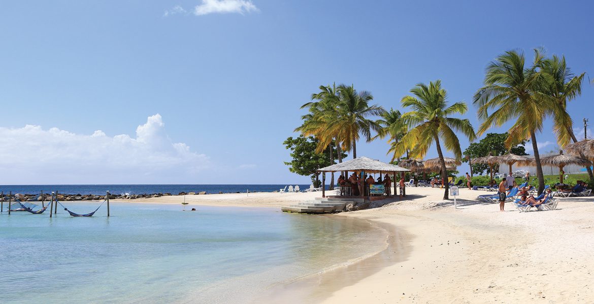 crescent-shaped-beach-windjammer-landing-resort-st-lucia