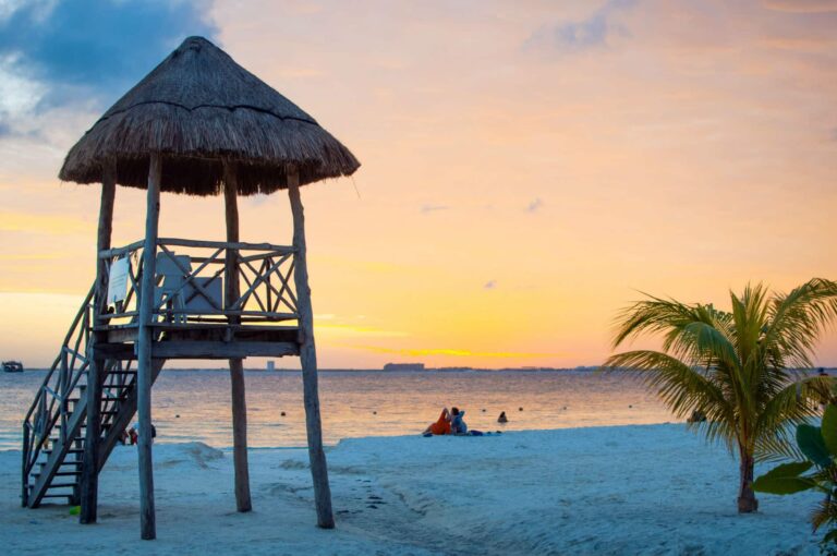 life-guard-stand-couple-isla-mujeres-beach-sunset