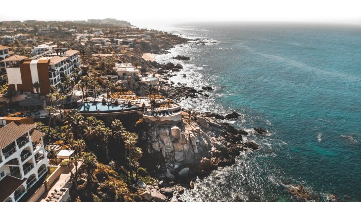 cabo-san-lucas-mexico-jagged-coastline-buildings-aerial-view