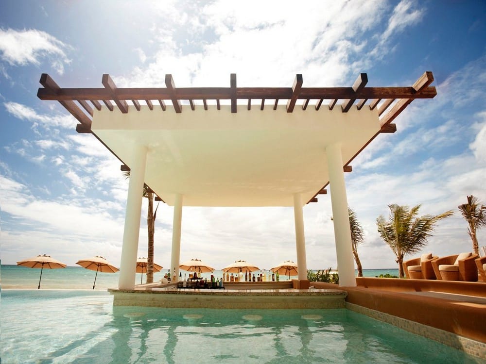 Sun cover next to a pool in the Banyan Tree Mayakoba