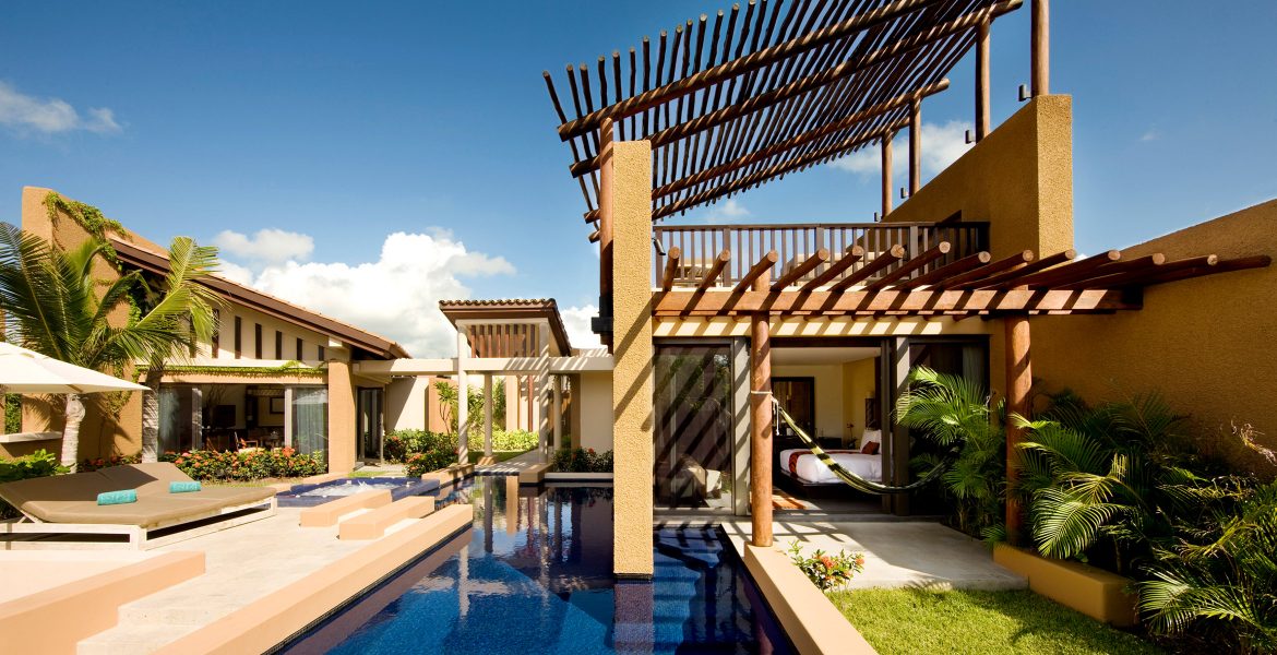 resort-buildings-pools-palapa-style-shade