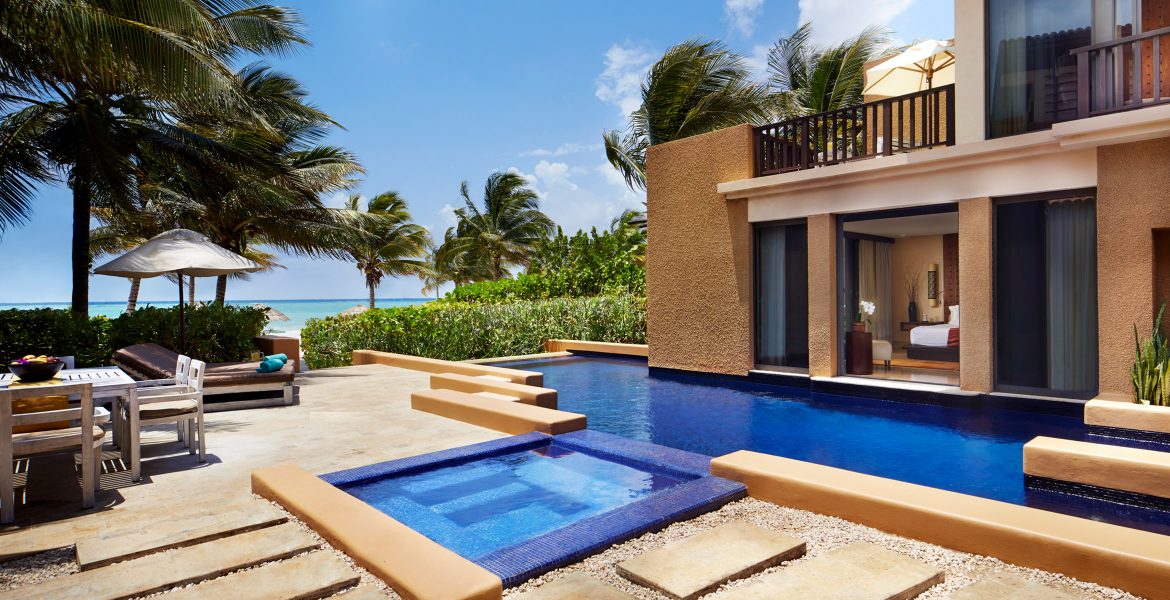 private-pool-at-resort-villa-surrounded-by-beach-jungle-blue-sky