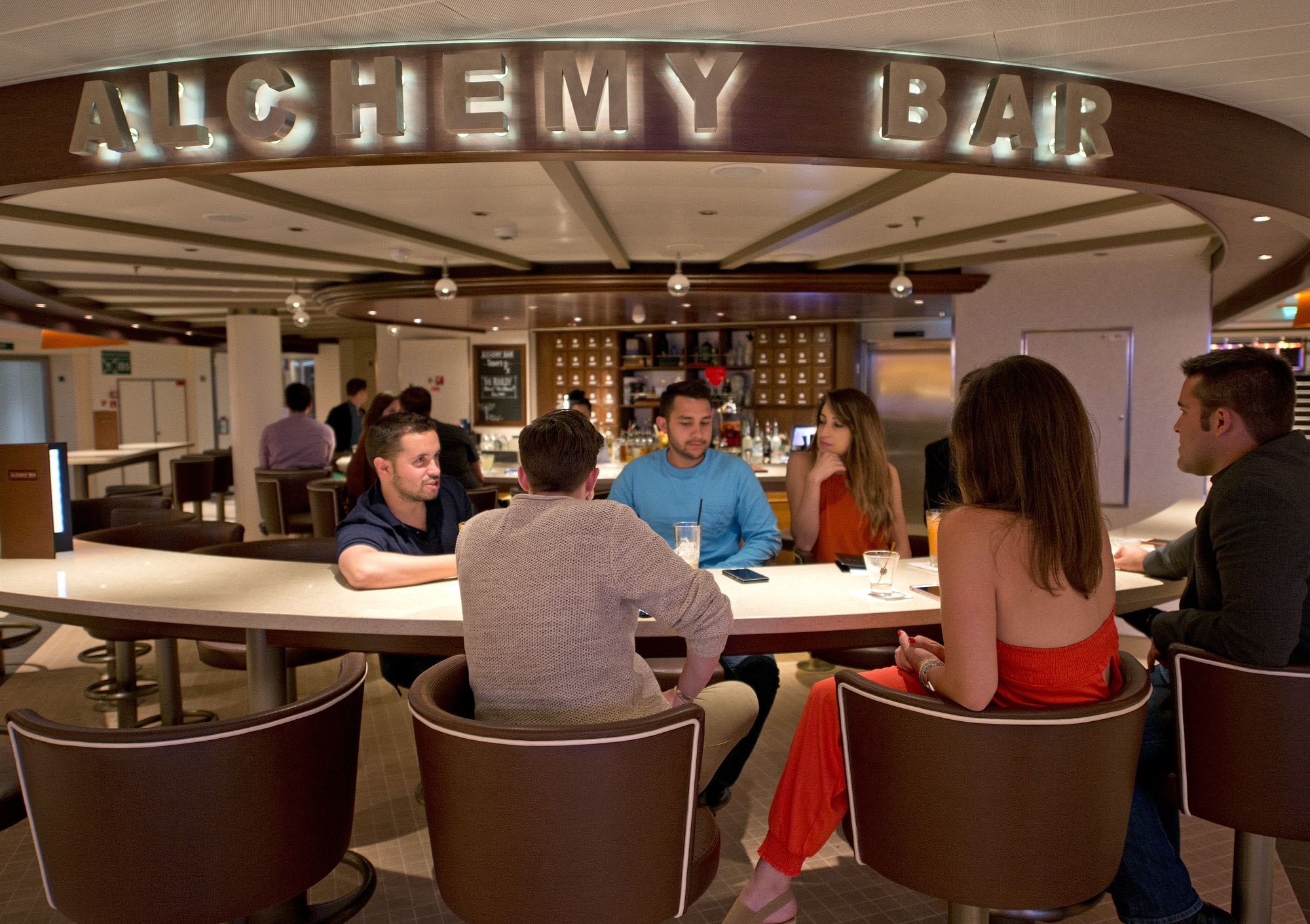 At the Carnival Vista's cocktail pharmacy-themed Alchemy Bar, mixologists prepare custom-designed cocktails using herbs, spices and other interesting ingredients. Photo by Andy Newman/Carnival Cruise Line