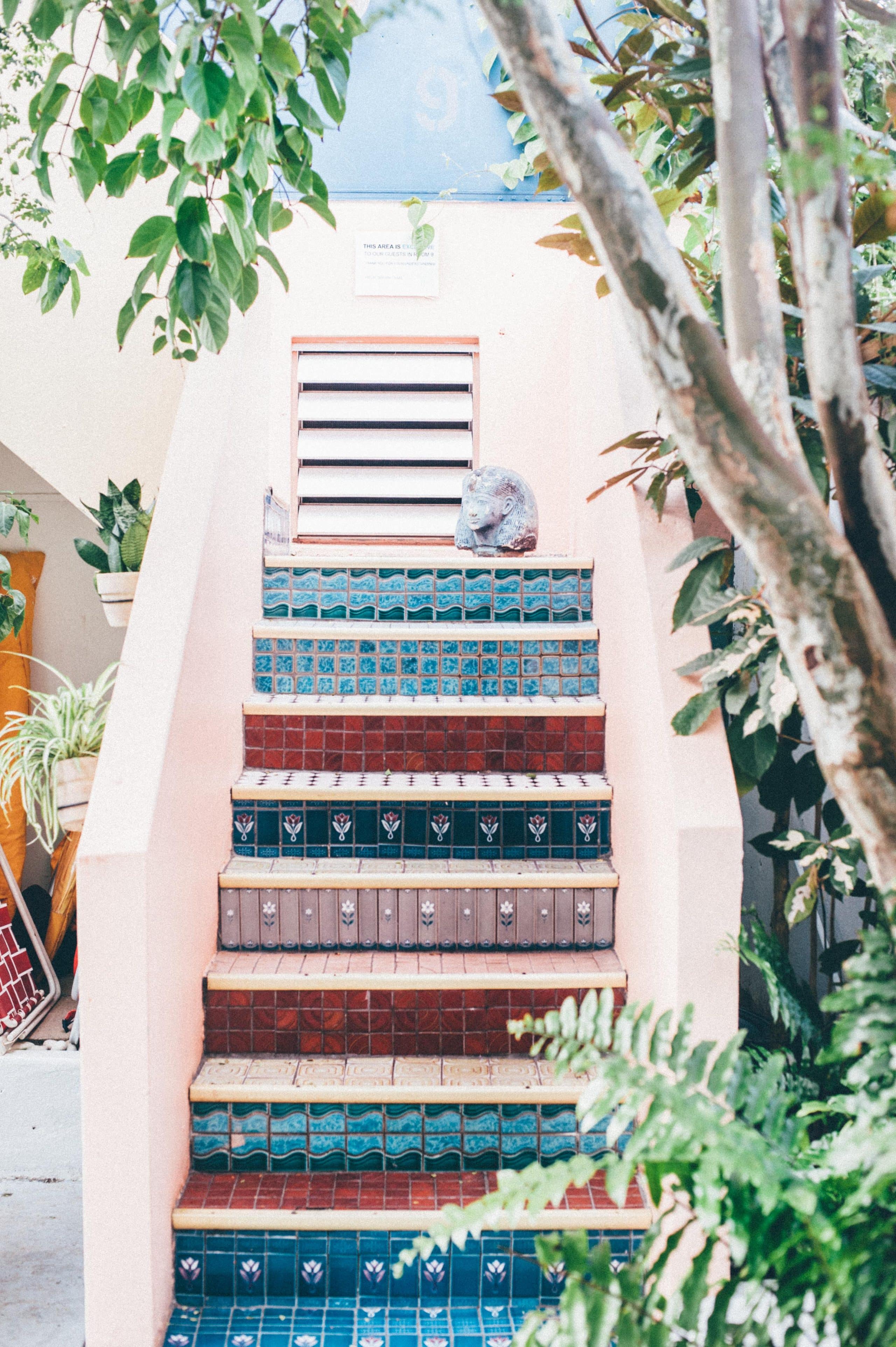 Beautifully tiled stairs lead up to a room at the Dreamcatcher Hotel