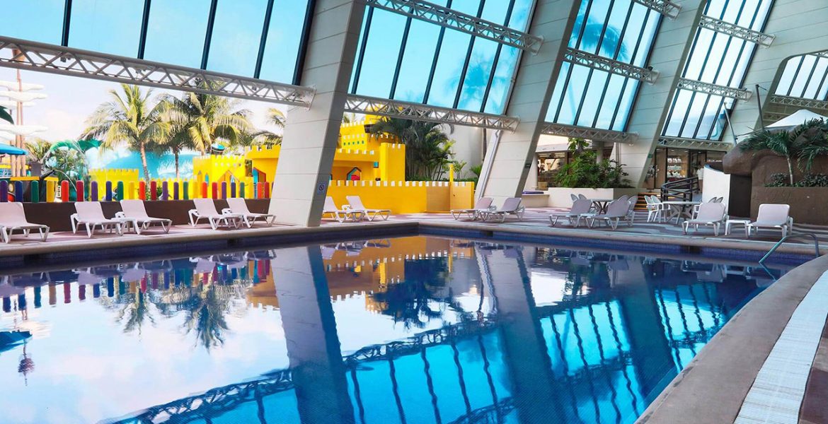 resort-indoor-pool-lounge-chairs