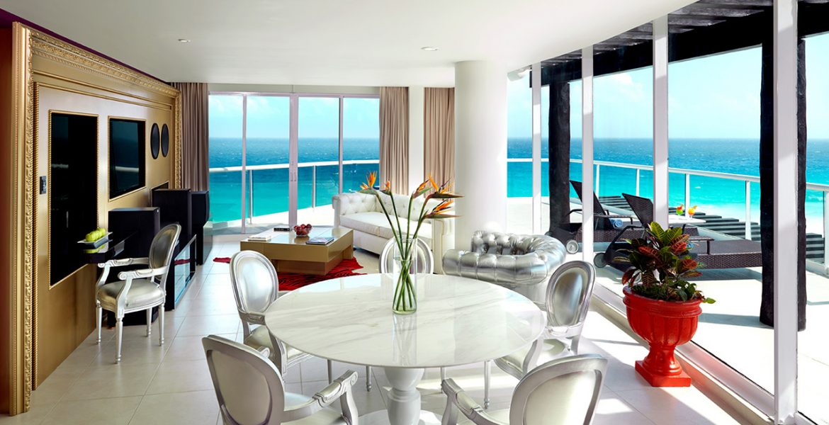 resort-suite-seating-area-ocean-view-glass-doors