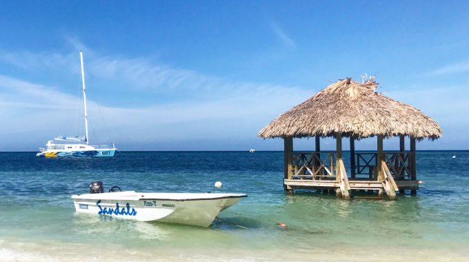 little-boat-in-water-hut-off-beach