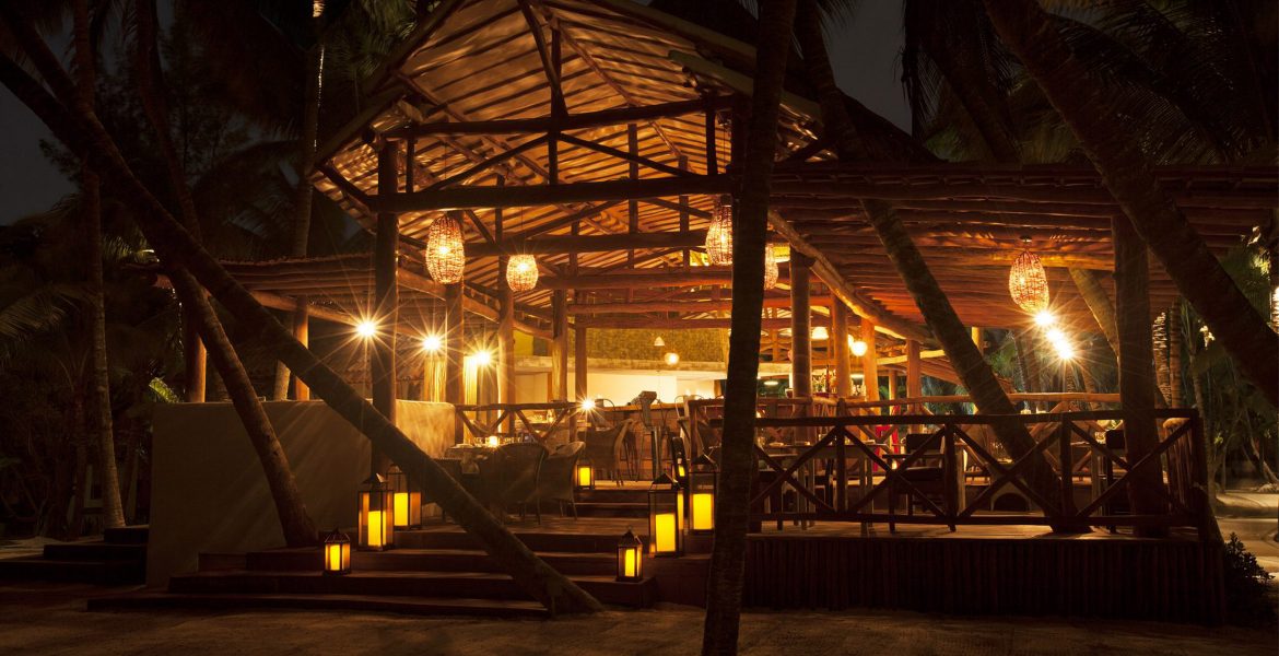 beach-hotel-lit-by-lanterns-nighttime