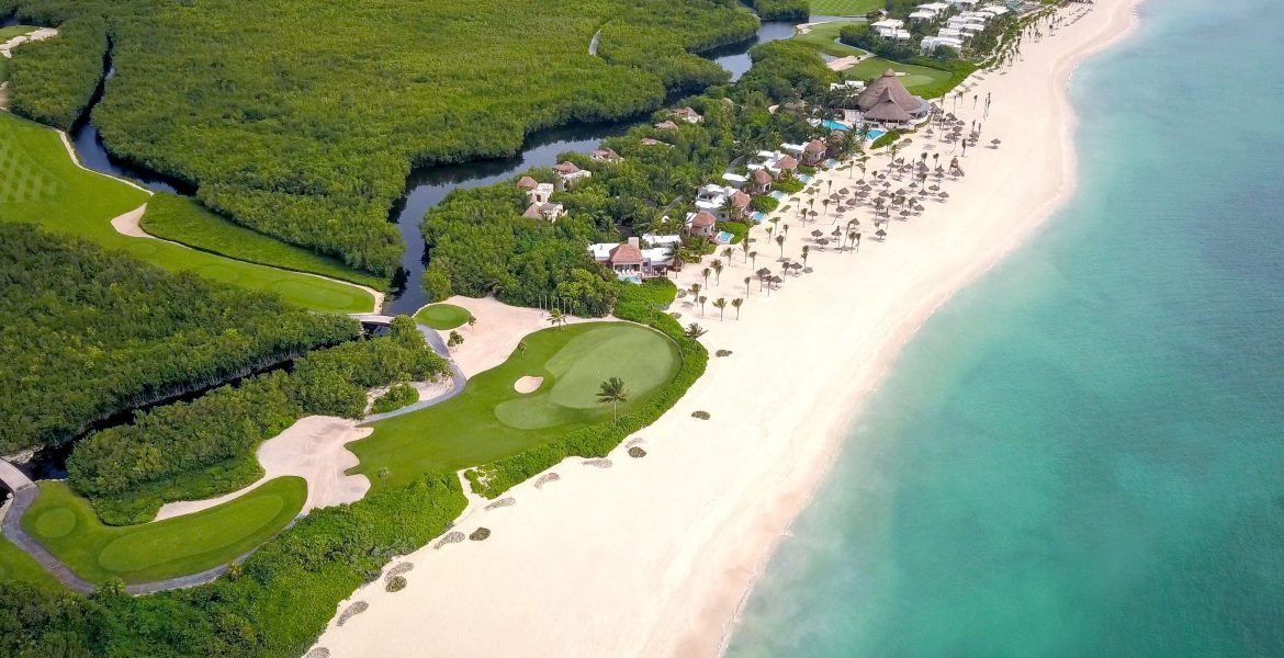 aerial-view-white-sand-beach-blue-ocean-jungle