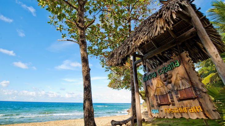 natura-cabana-hotel-sign-on-beach