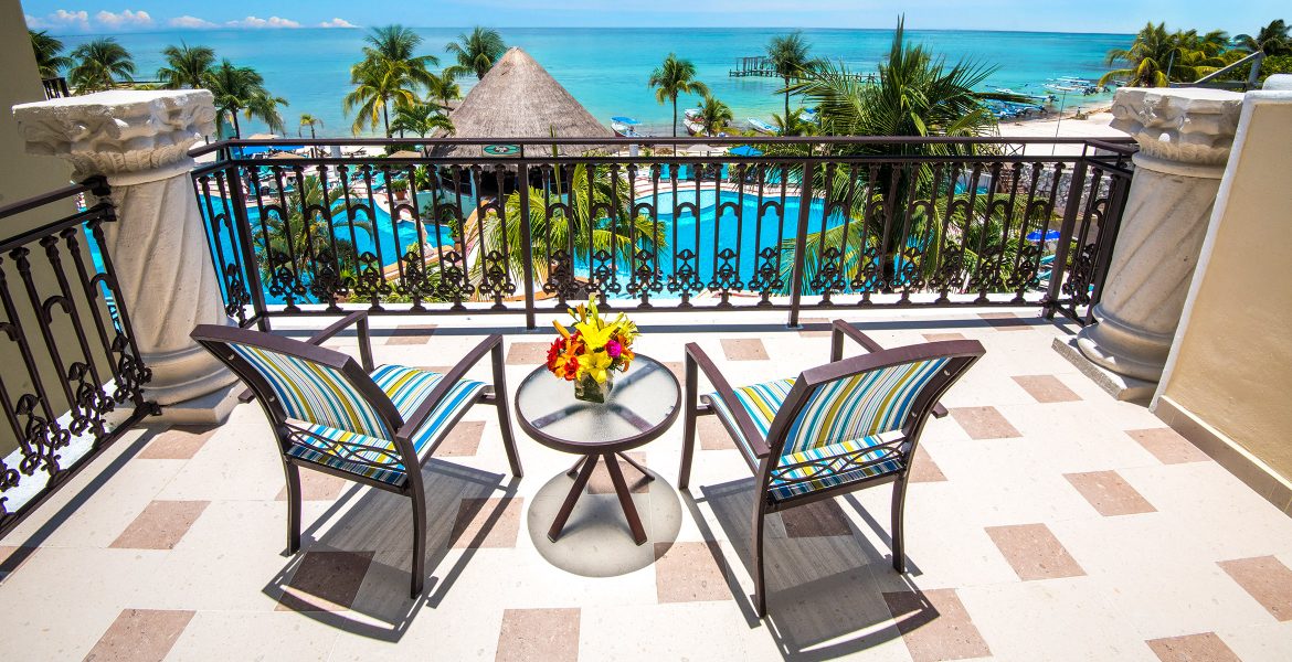 ocean-view-from-resort-suite-balcony-two-chairs-end-table