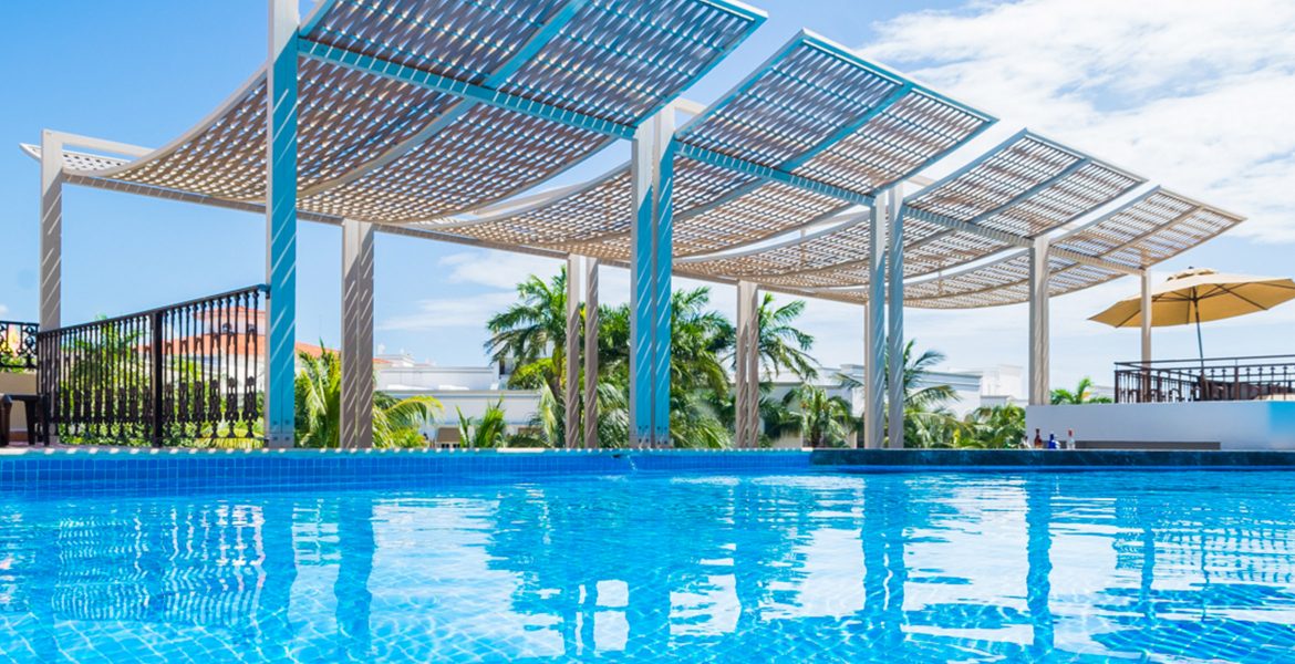 resort-bright-blue-pool-with-awning