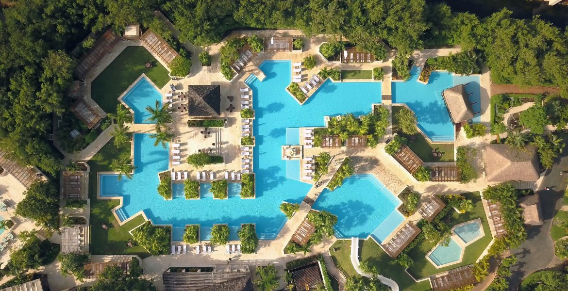 aerial-view-beach-resort-pool-palm-trees