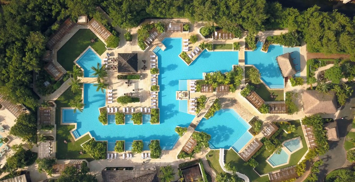 aerial-view-beach-resort-pool-palm-trees