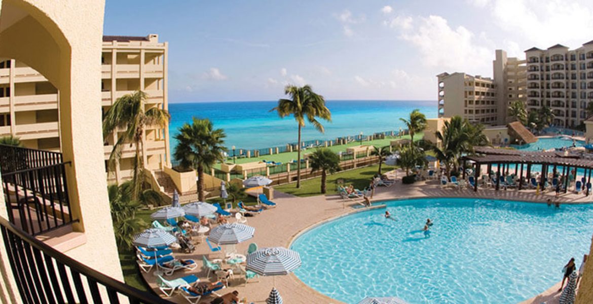 aerial-view-resort-pool-beach-palm-trees