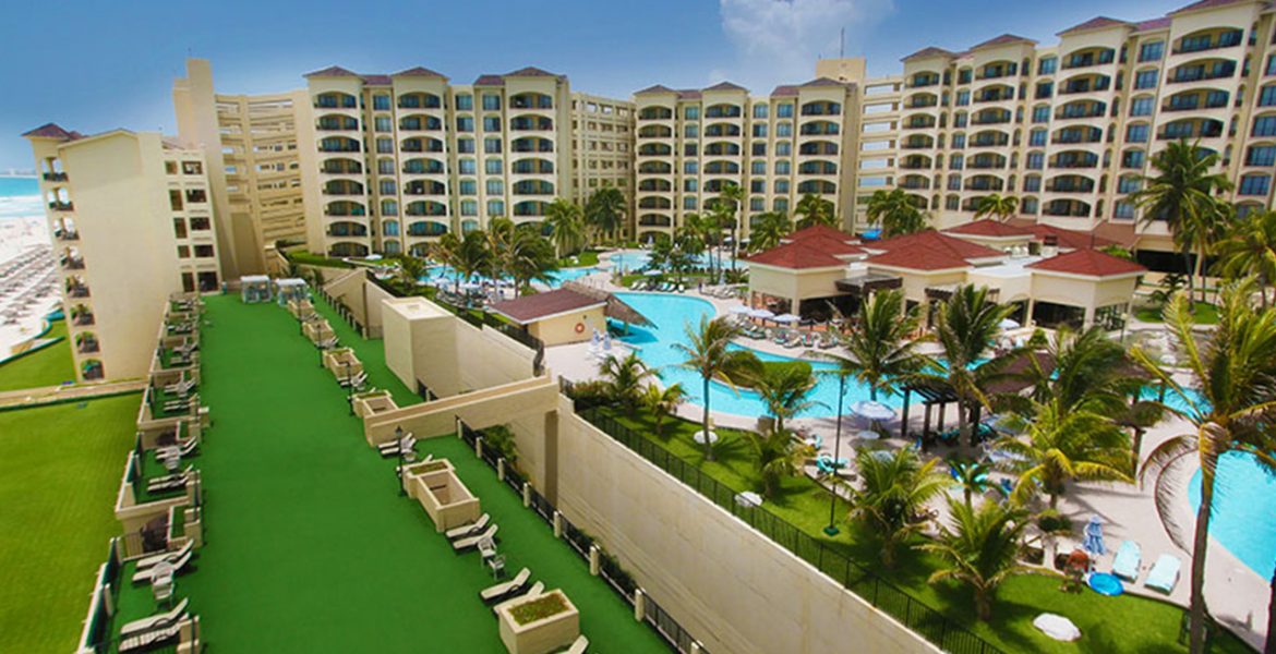 aerial-view-resort-pool-beach-palm-trees