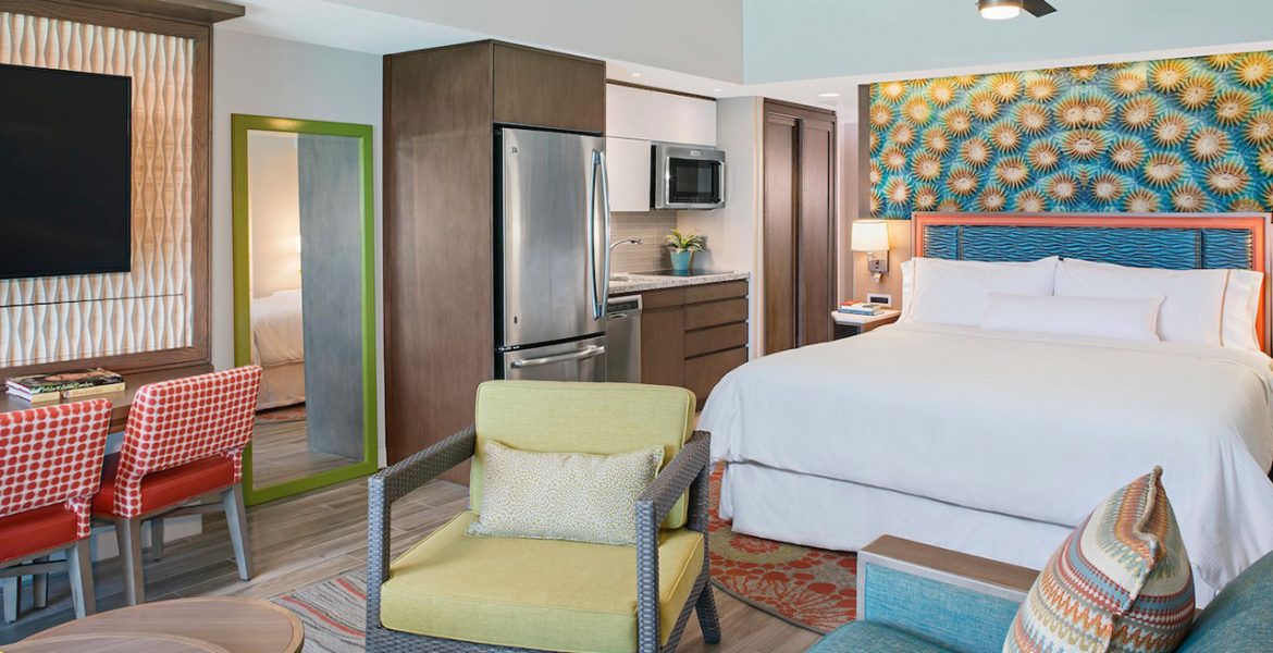 resort-suite-bed-kitchenette-seating